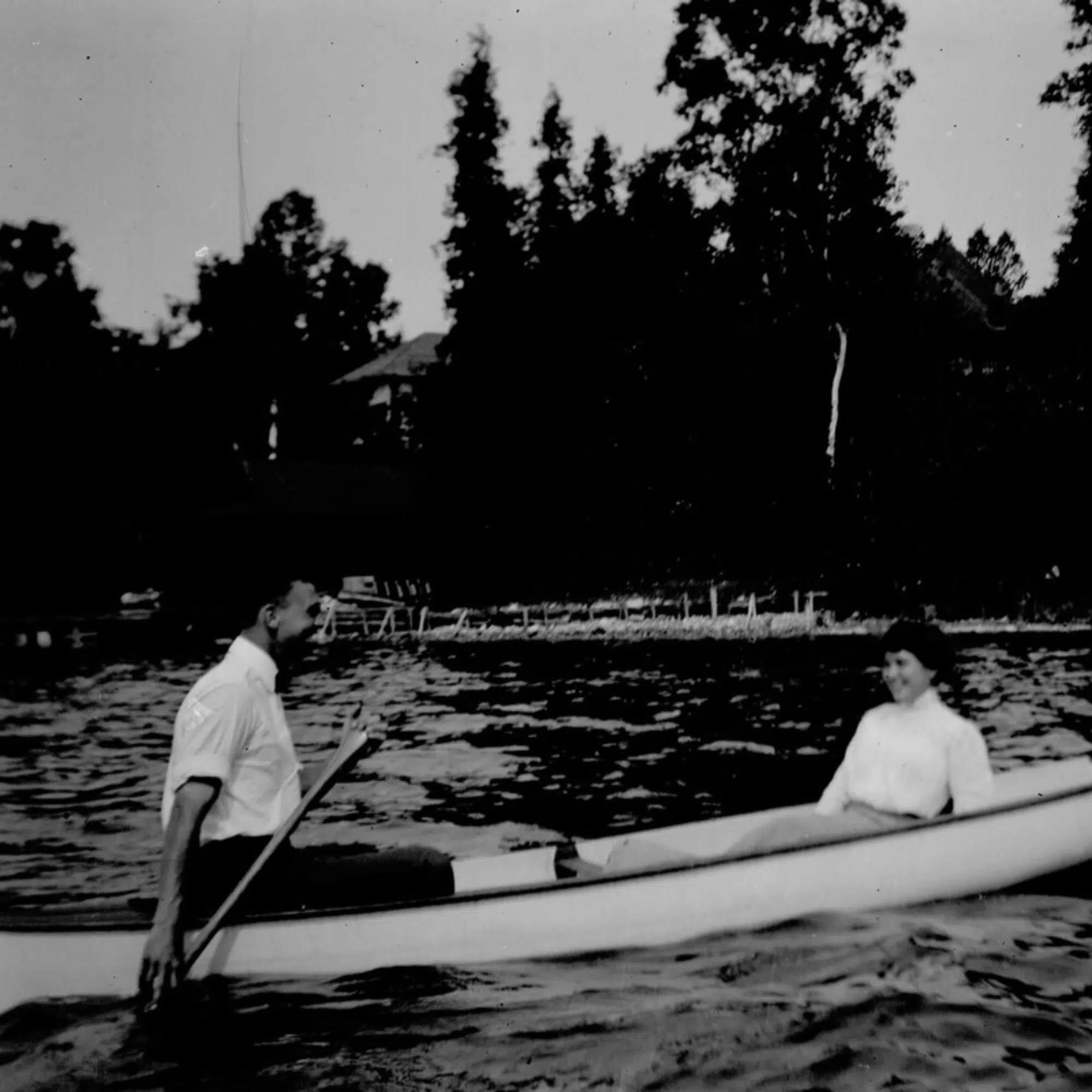 Unidentified people in canoe in Les Cheneuax, part of the Leopold family photos, ca. 1910-19.