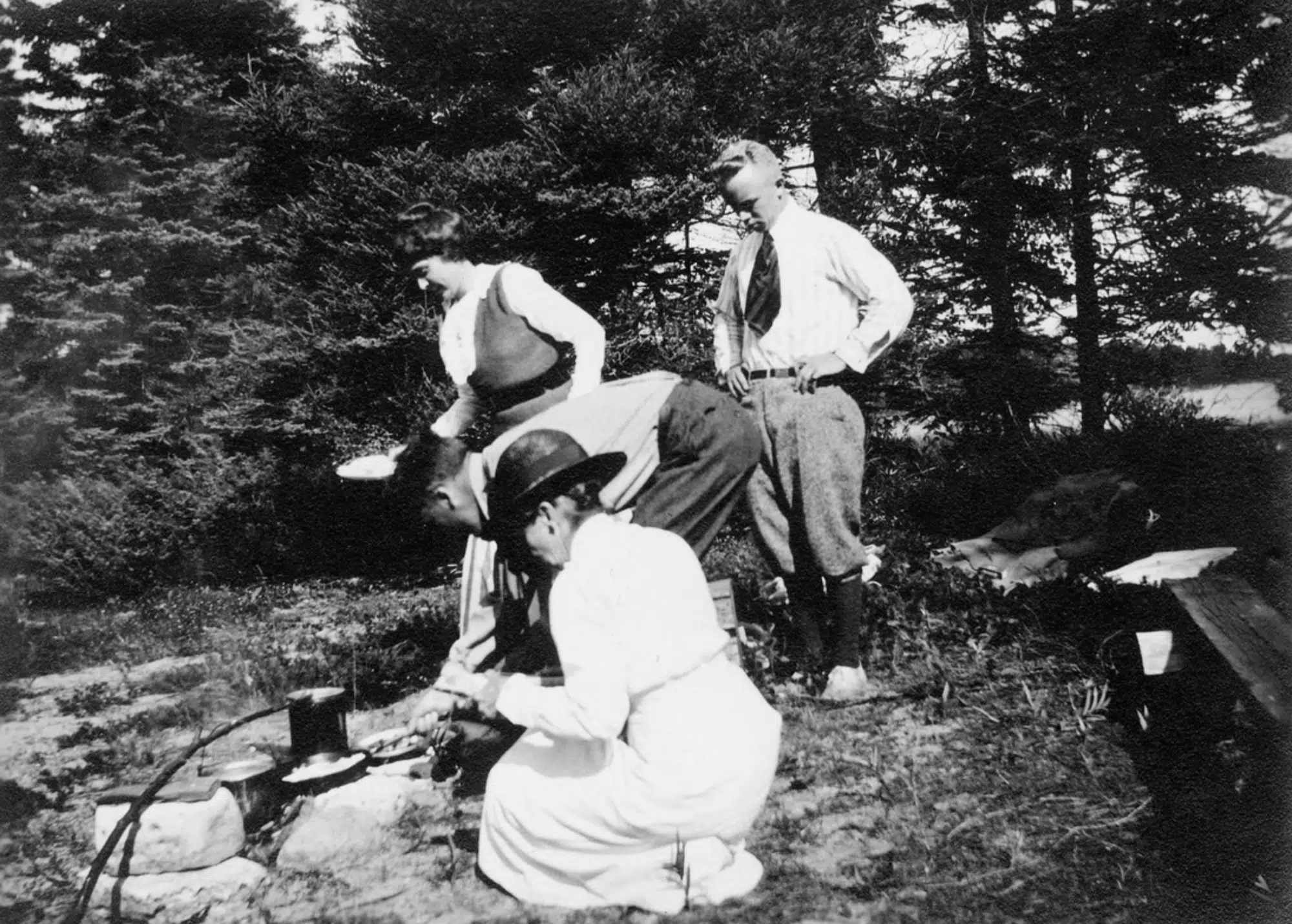 Aldo’s brother, Carl, and others at camp in Les Cheneaux, ca. 1900-09.